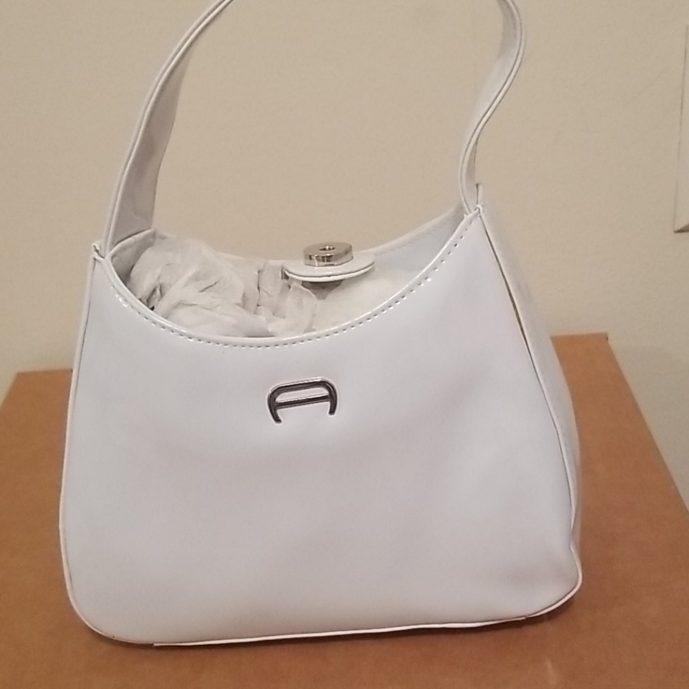 Handbags etienne aigner